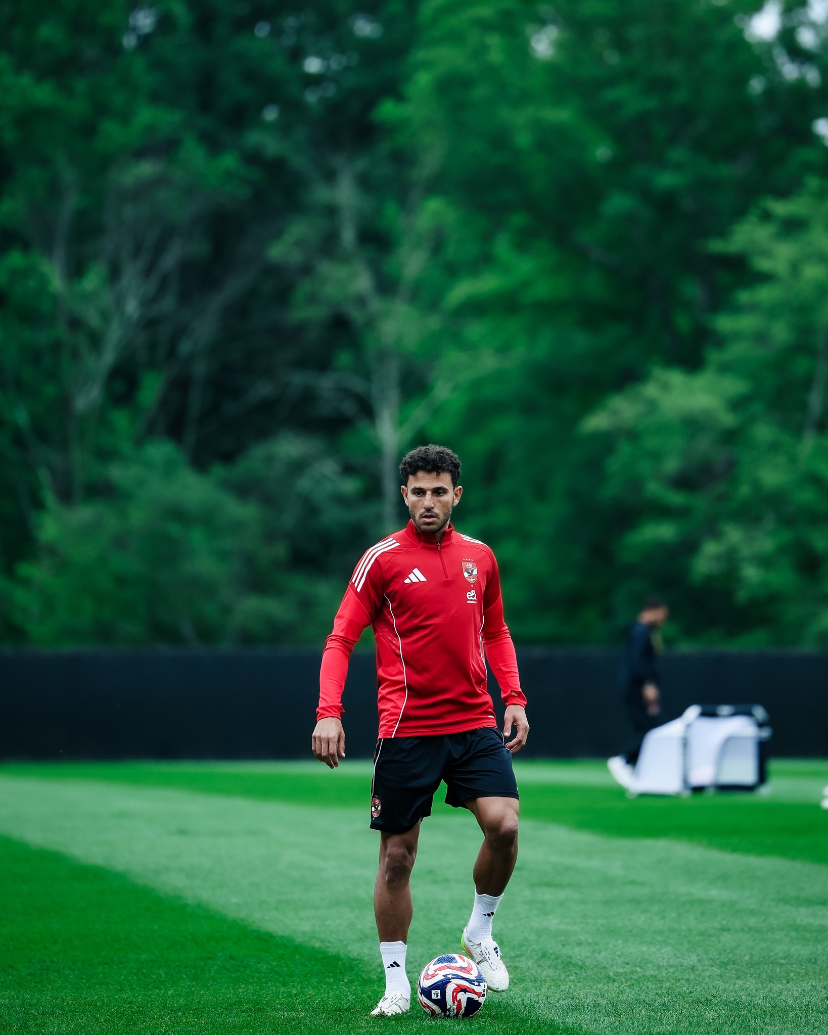 May be an image of 2 people, people playing soccer, people playing football and text