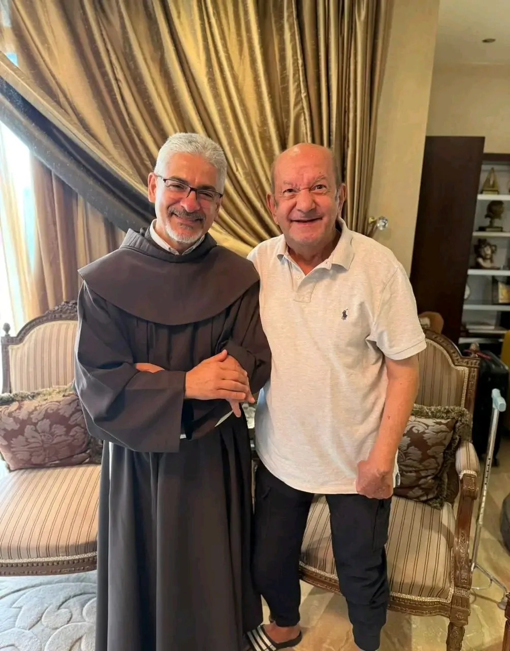 لطفي لبيب والأب بطرس دانيال