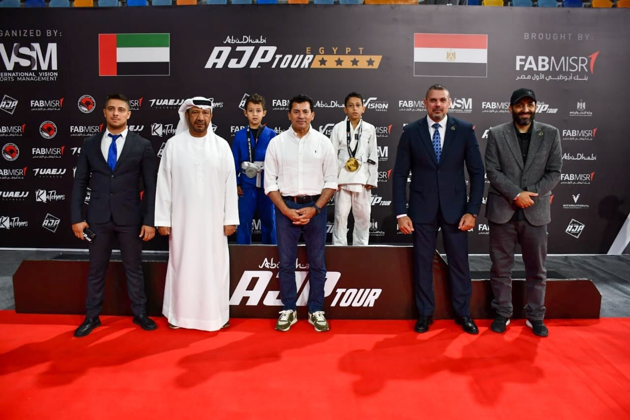 May be an image of ‎7 people and ‎text that says '‎VSM RNATIONAL VISION AbaDhabi Dhabi Aba AJPTOUR JP FAB FABMISRT ISRT BMISR TUAEJJ 1지 FAB ISR BROUGHT FABI EJJ FAB SR 7 AB AbaDkua FAR: ISION TUAEJJ FABMIS FABMISR مصر دول الو انوطنى به ب VSM FABMIS! UAEJJ Kl-Thyrs Tehrs H7P DIE ไต้ทลร Μ AJP FABMISR FABA AbaDhabi Prue FAB VISR FA AJP Abi ん AL ALNTOUR TOUR‎'‎‎