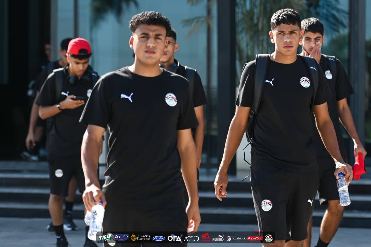 May be an image of ‎soccer, football and ‎text that says '‎TIGER دانون 459E Carrier OrA OLAACUS ACUD PUMA. S للرياضة المتحدة ディア‎'‎‎