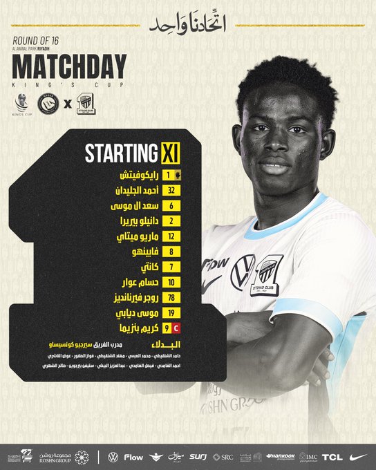 Graphic poster in yellow and black tones displays Round of 16 Matchday for Kings Cup with Al-Ittihad logo and sponsors. Starting XI section lists eleven player names in Arabic including Fawaz Fallatah and Haroune Camara with numbers one to eleven. Central image shows a young Black male player in white and blue Al-Ittihad jersey standing with arms crossed smiling at camera. Bottom text in Arabic details bench players and match information against Al-Nassr.