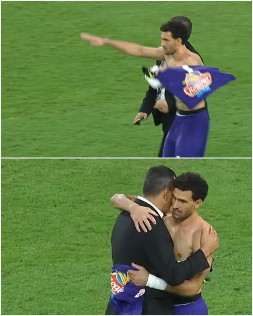 عواد يصافح عصام الحضري