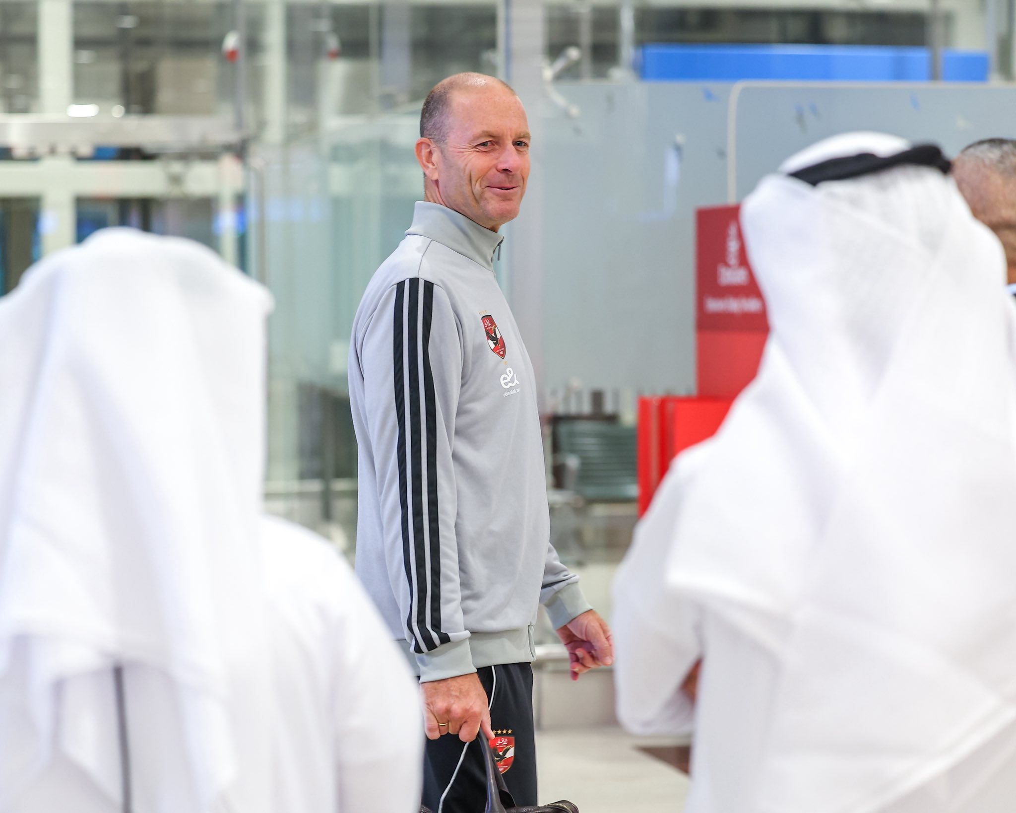 May be an image of one or more people and text