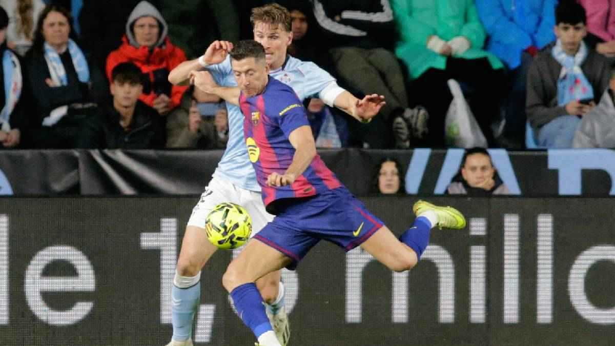 ليفاندوفسكي يقود برشلونة لفوز مثير على سيلتا فيغو بالدوري الإسباني (فيديو)